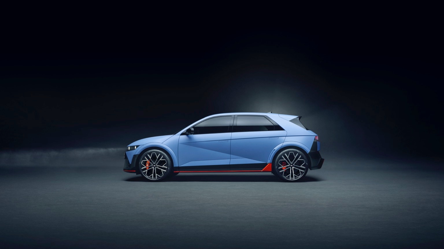 a blue car with black trim