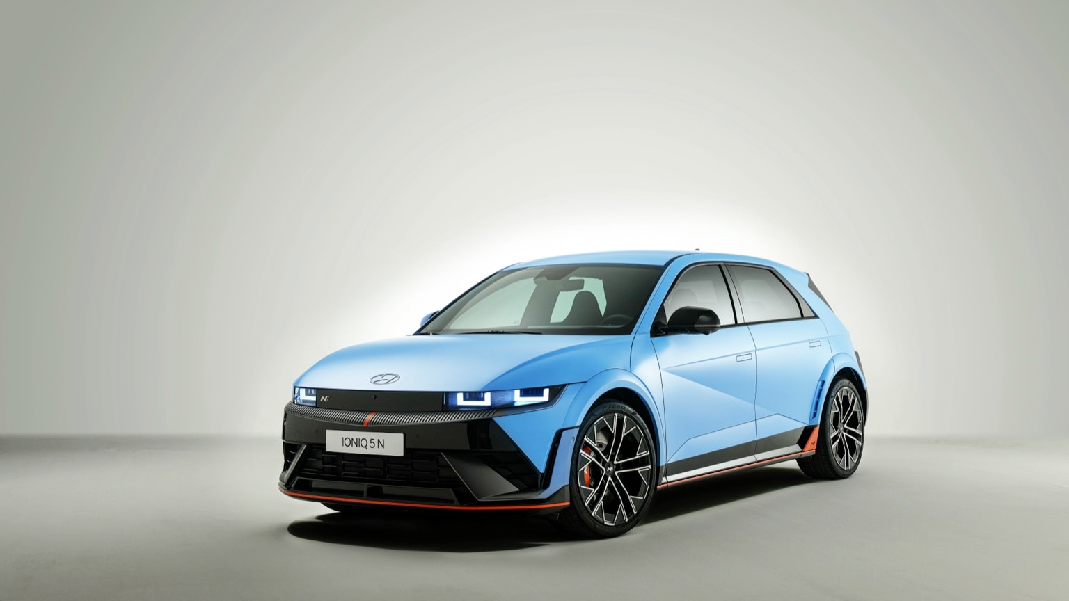 a blue car with black trim