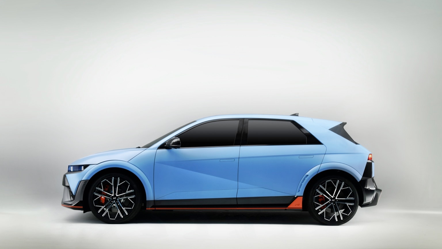 a blue car with black trim