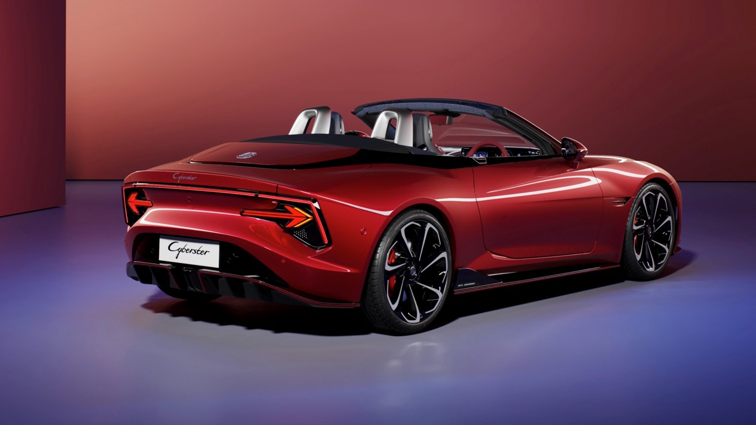 a red sports car with a convertible top
