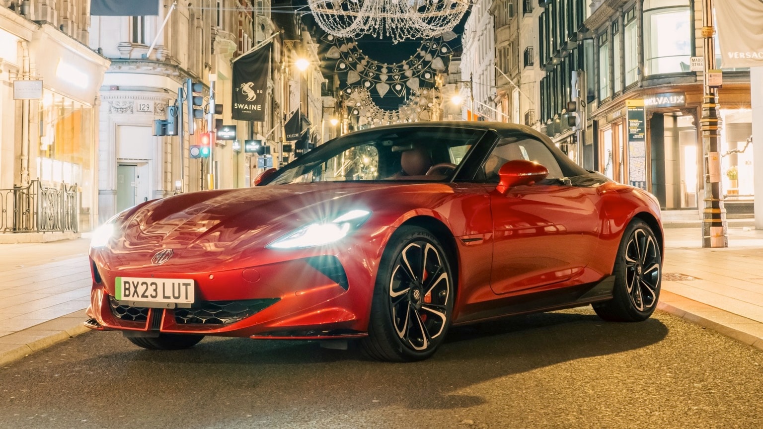 a red sports car on a street
