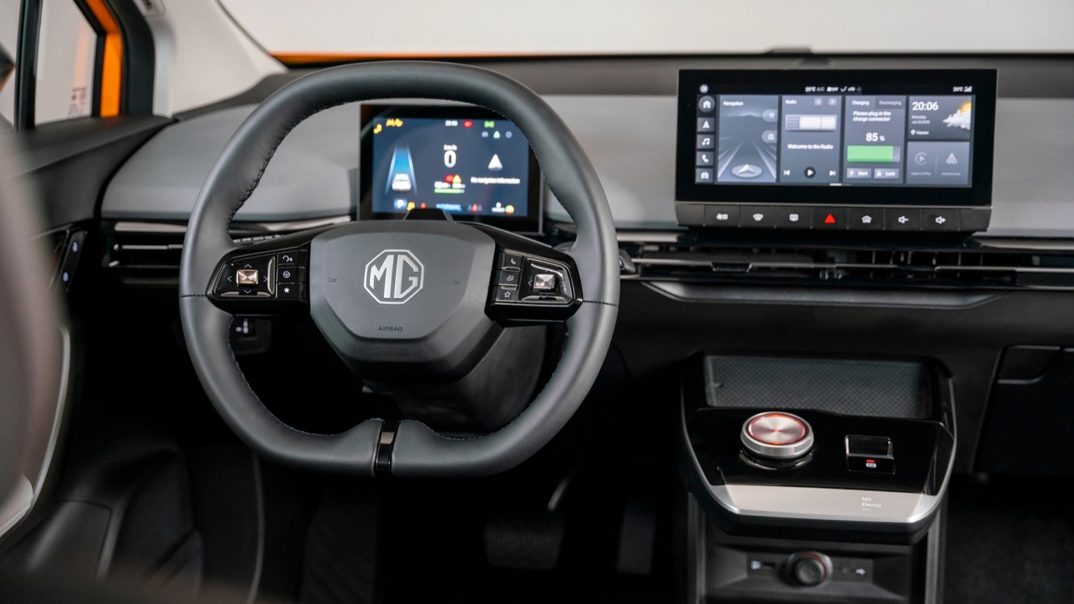 a steering wheel and a touch screen device