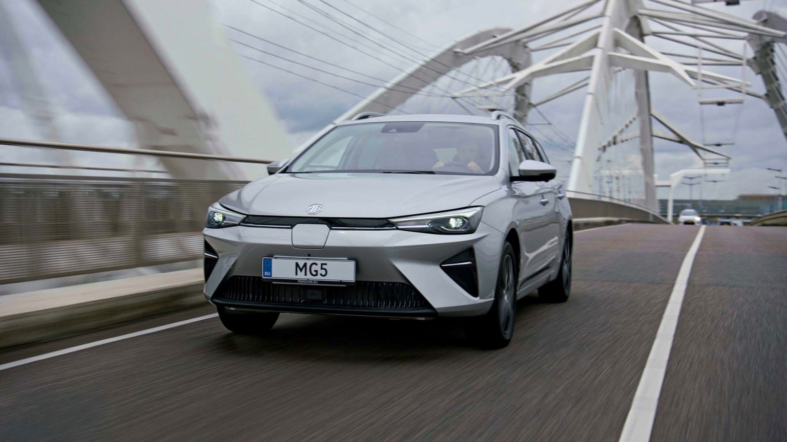 a car driving on a bridge