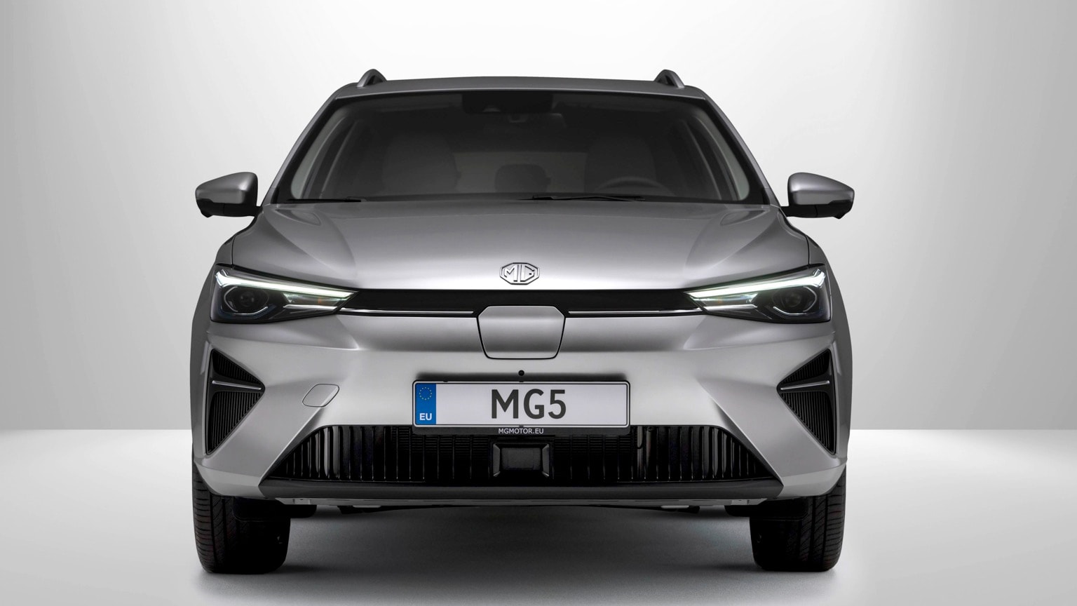 a silver car with a white background