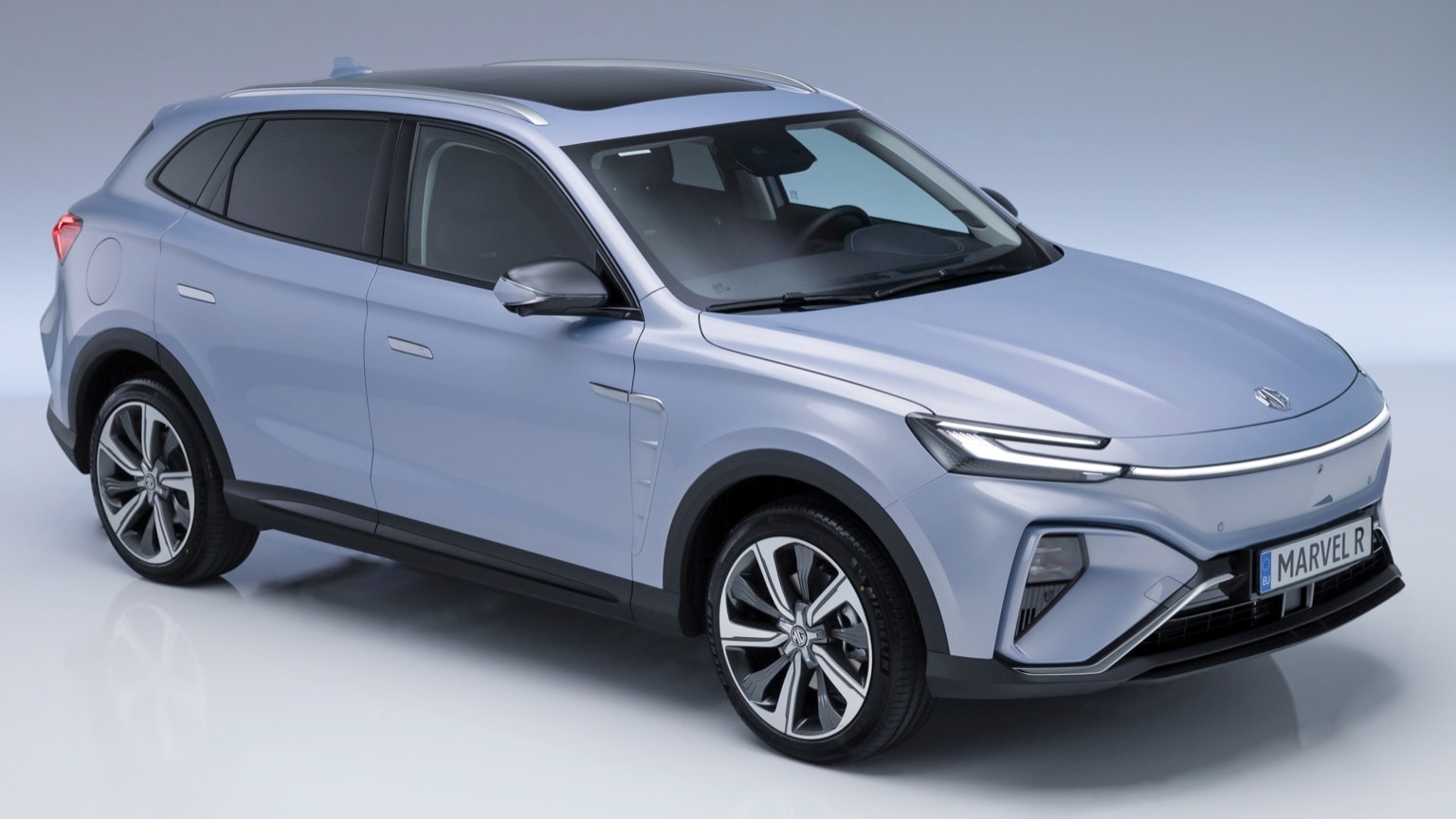 a silver car on a white background