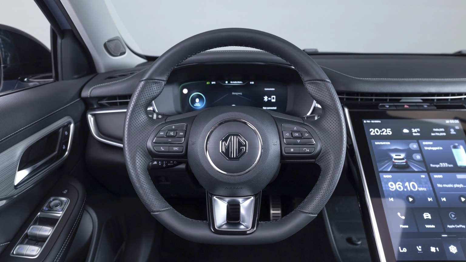 the steering wheel and dashboard of a car