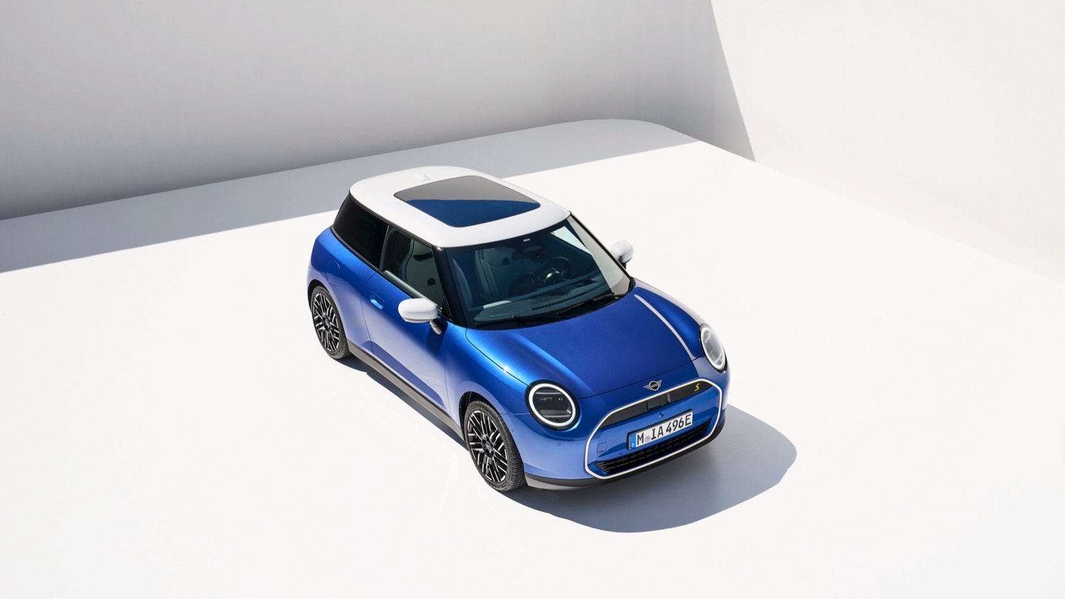 a blue car with white roof