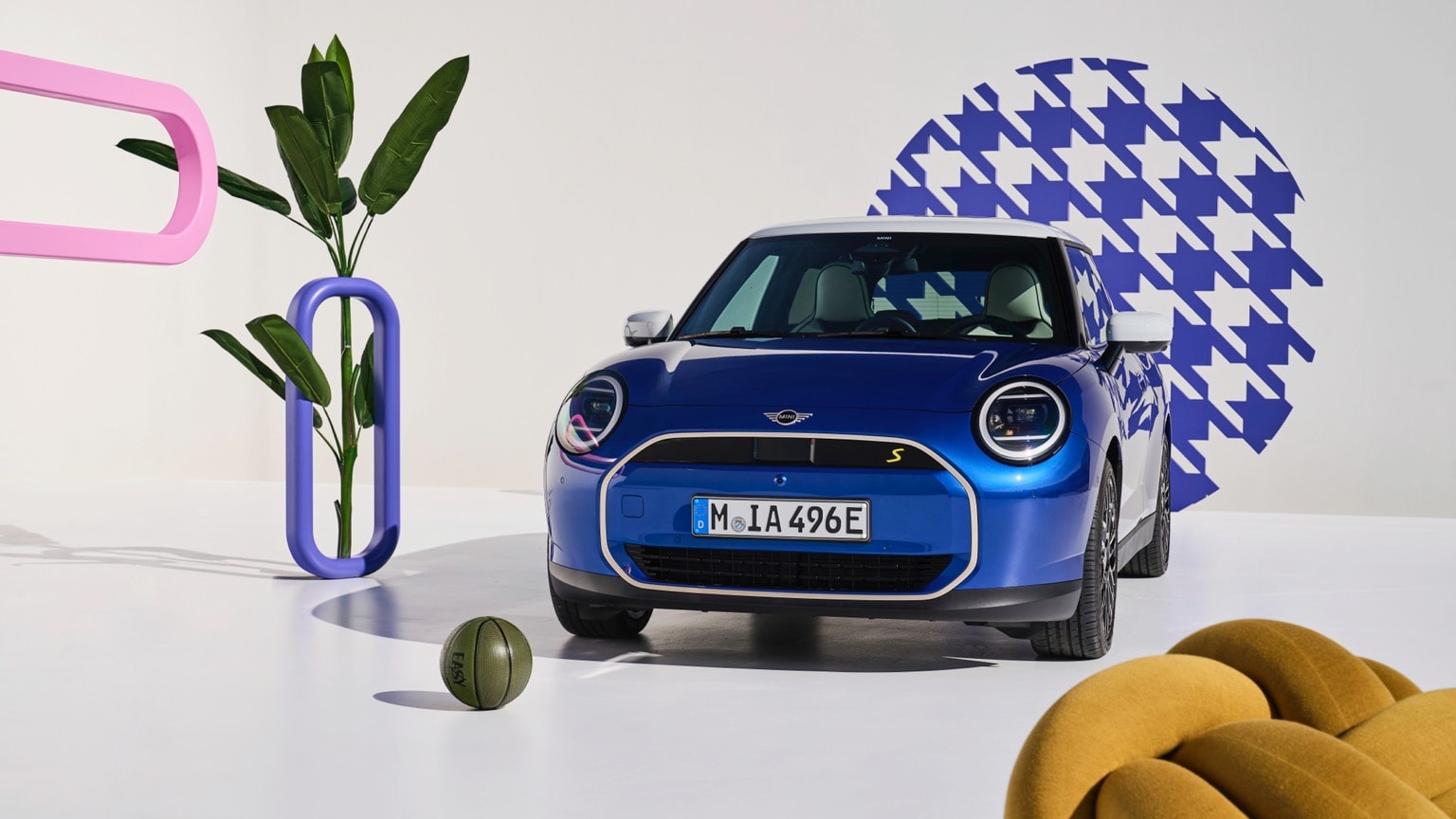 a blue car parked in a room