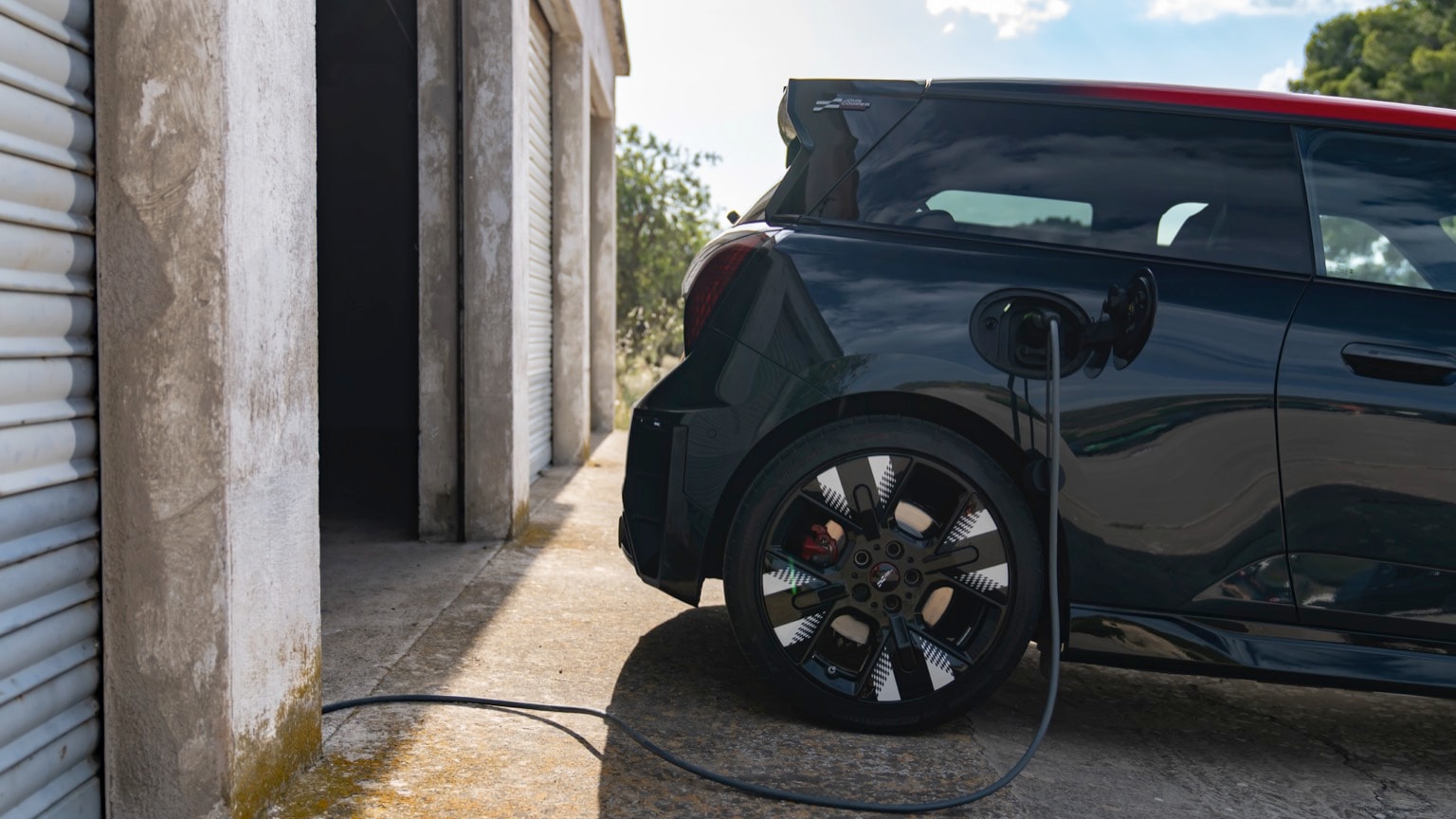 a car charging at a garage