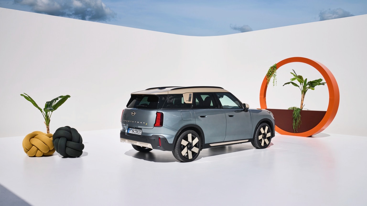 a car parked in a white room