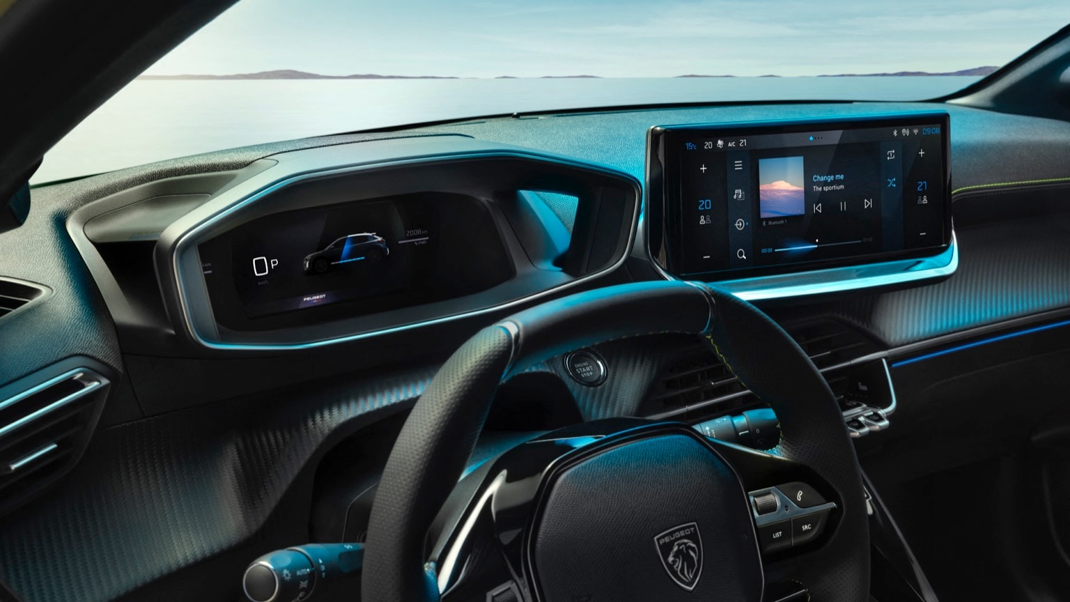 l'intérieur d'une voiture avec un volant et un tableau de bord