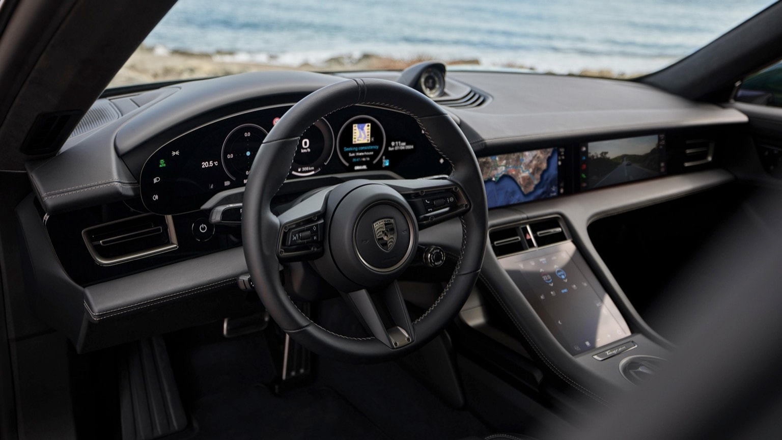 the interior of a car with a steering wheel and dashboard