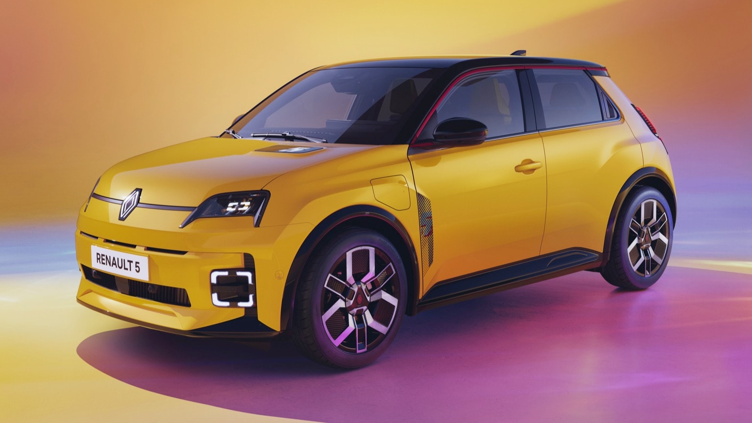 a yellow car with black trim