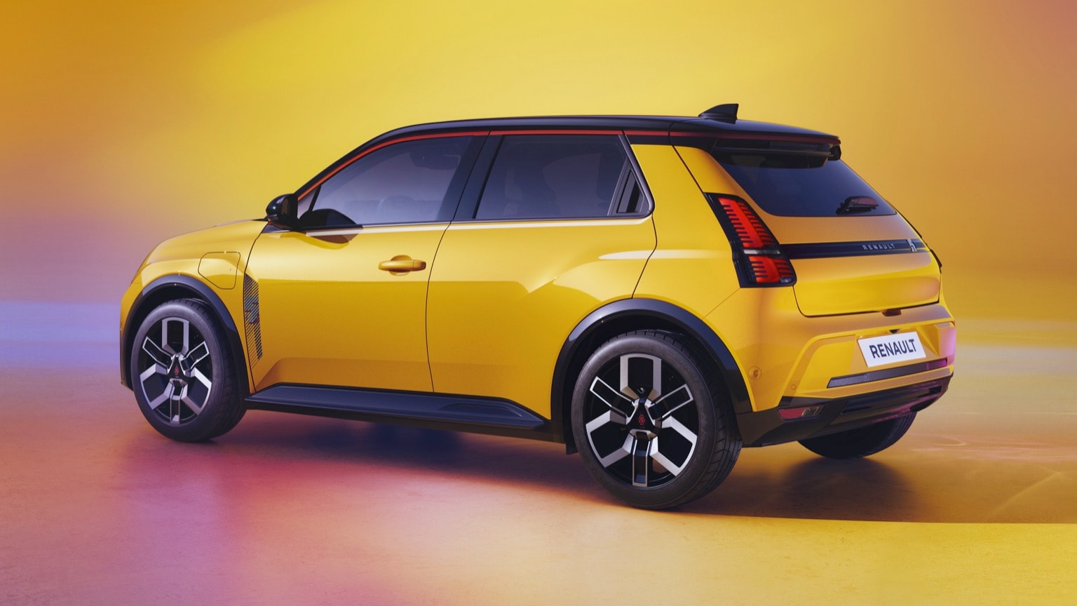 a yellow car with black trim
