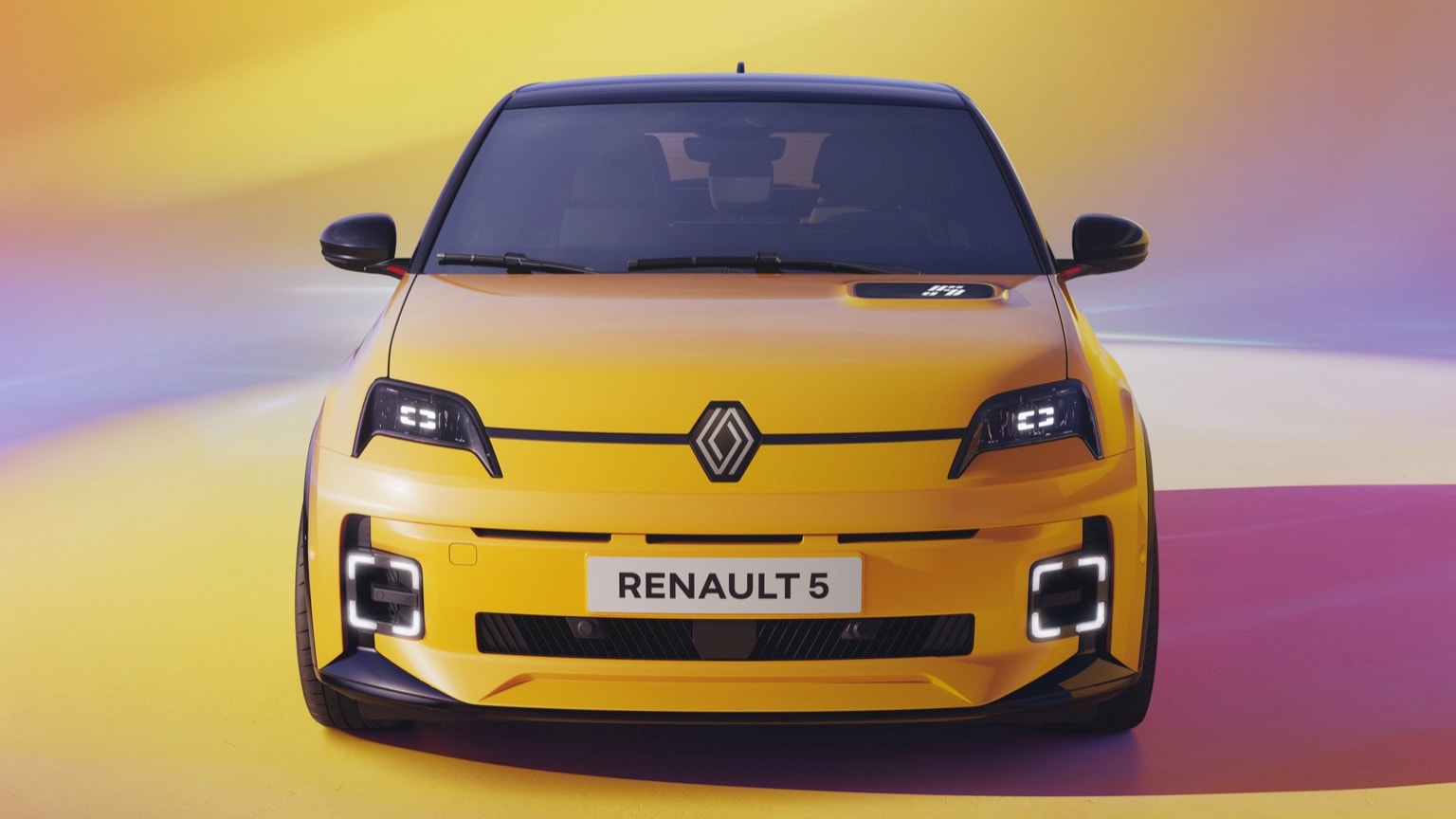 a yellow car with its headlights on