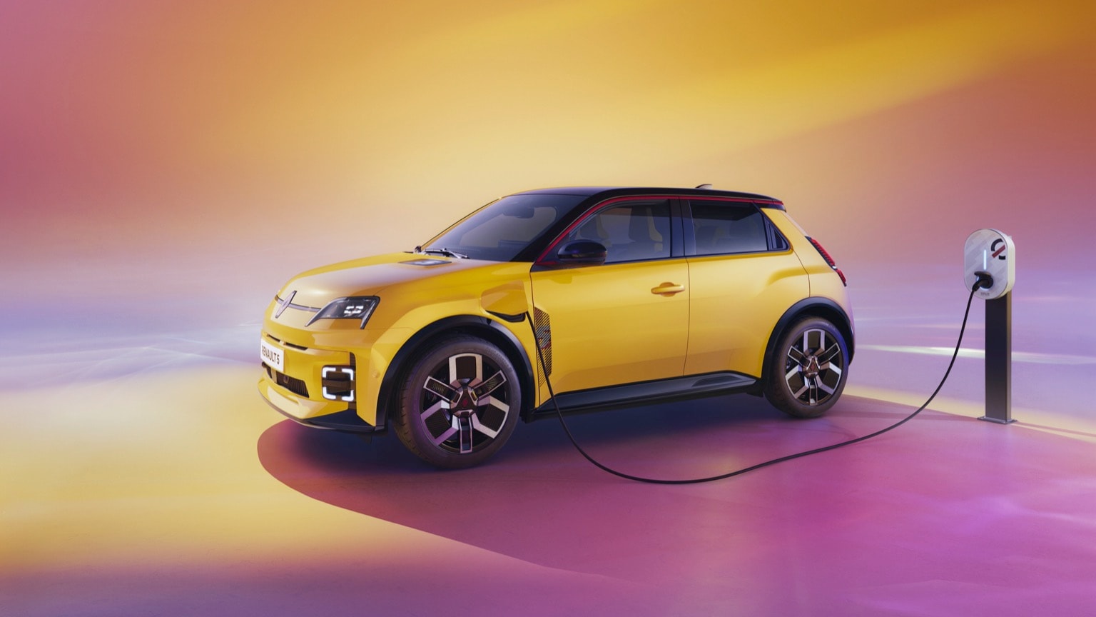 a yellow car with a black roof
