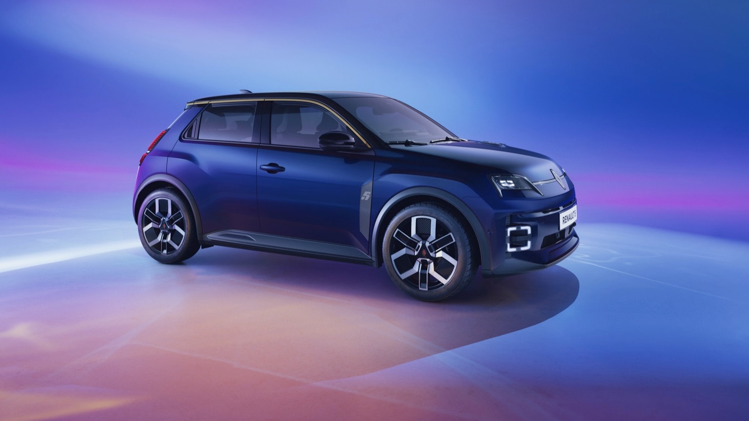a blue car parked on a reflective surface