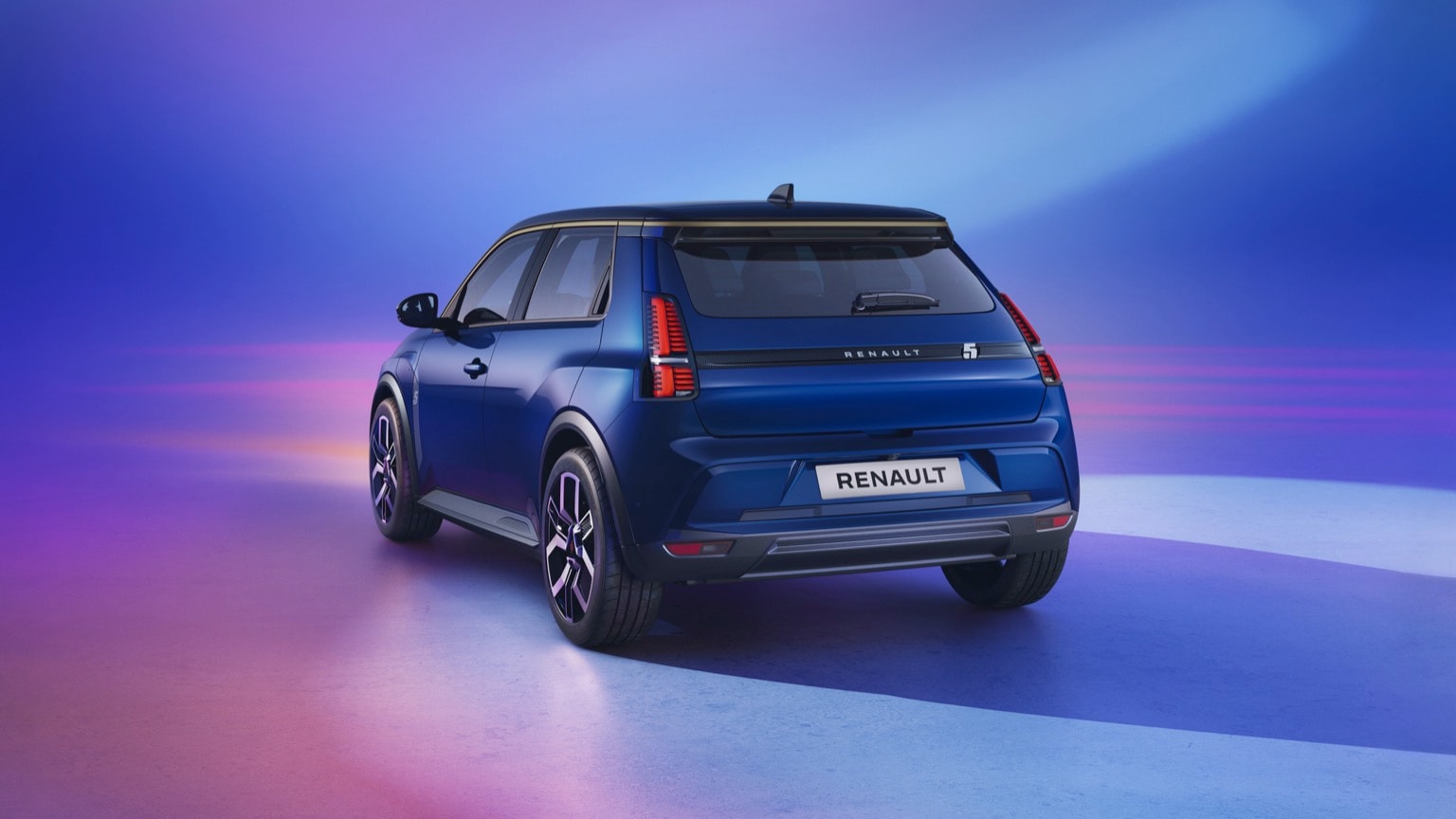 a blue car parked on a blue surface