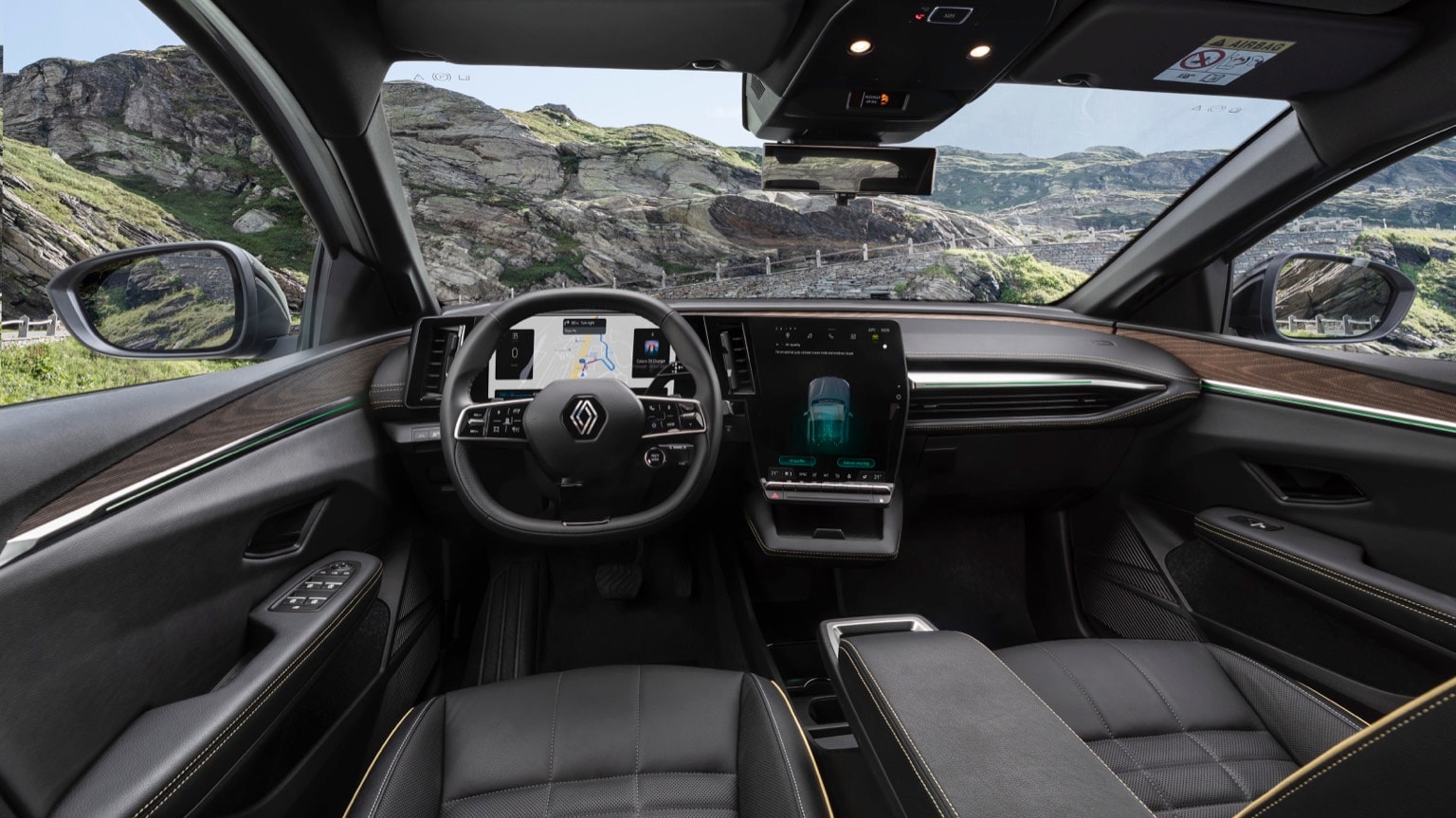 l'intérieur d'une voiture avec vue sur des montagnes et des rochers
