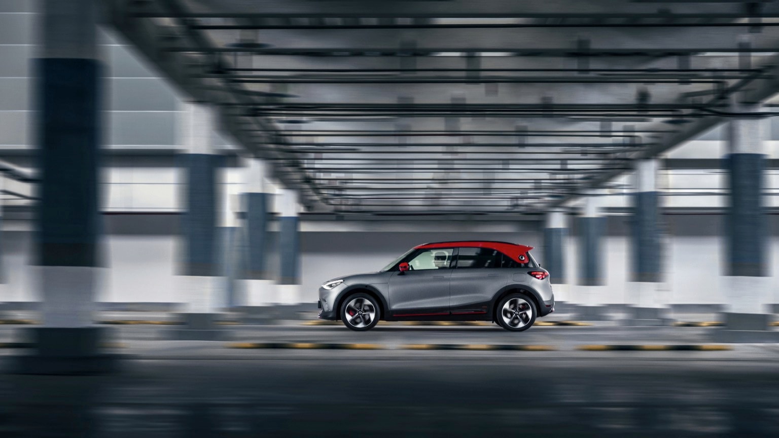 a car driving in a parking garage