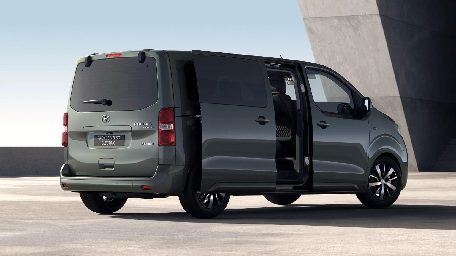 a green van with its doors open