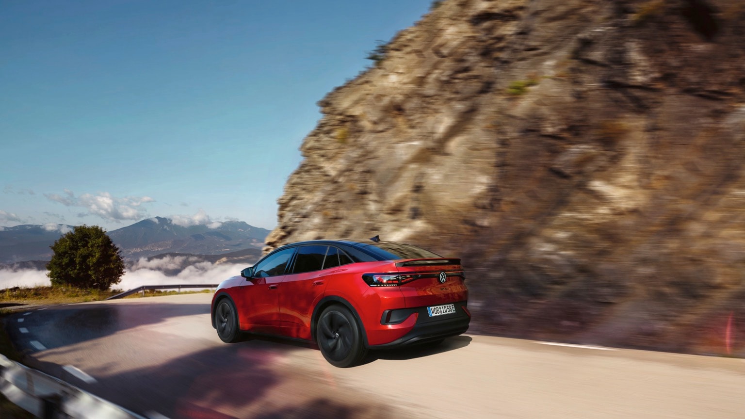 a red car on a road