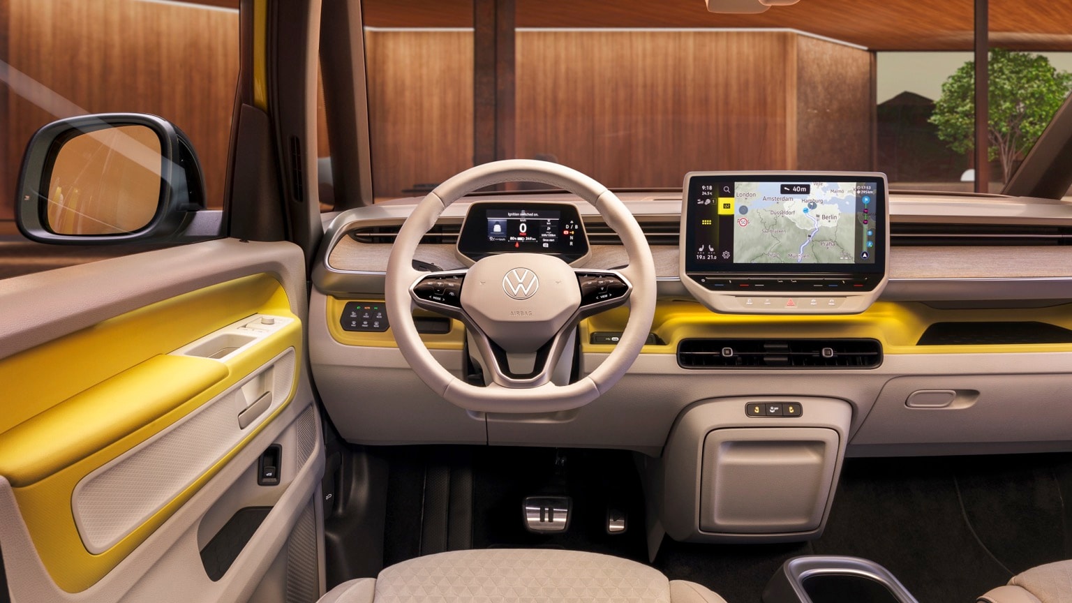 l'intérieur d'une voiture avec un volant et un écran tactile