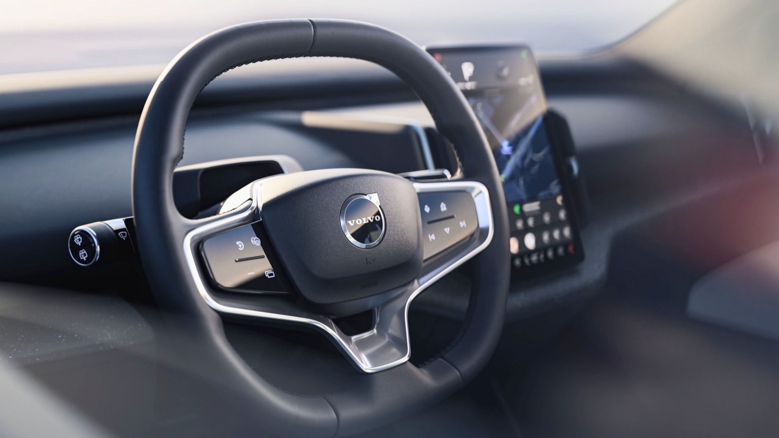 un volant et un téléphone dans une voiture