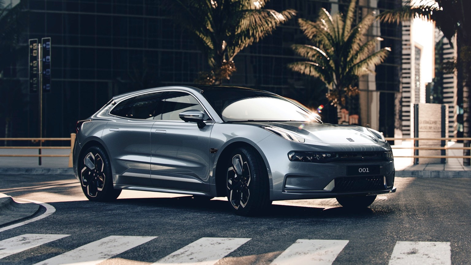 a silver car parked on a street